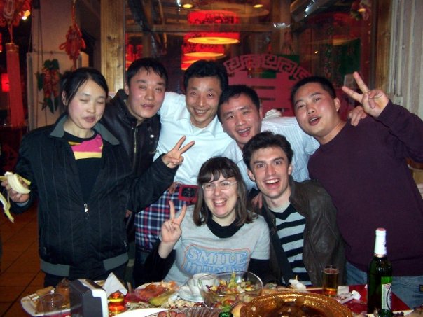 Myself (center left) and a friend (center) at a company dinner party in Beijing for Lunar New Year 2009