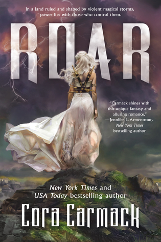The cover of Cora Carmack's "Roar." A Caucasian woman with bright white hair, a white dress, and knives strapped to her back stands on a small, rocky hillock with her back to the viewer, facing a stormy purple sky.