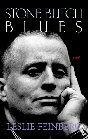 A cover of "Stone Butch Blues" by Leslie Feinberg, featuring a black and white portrait of Feinberg with their left hand on the side of their face, looking thoughtful.